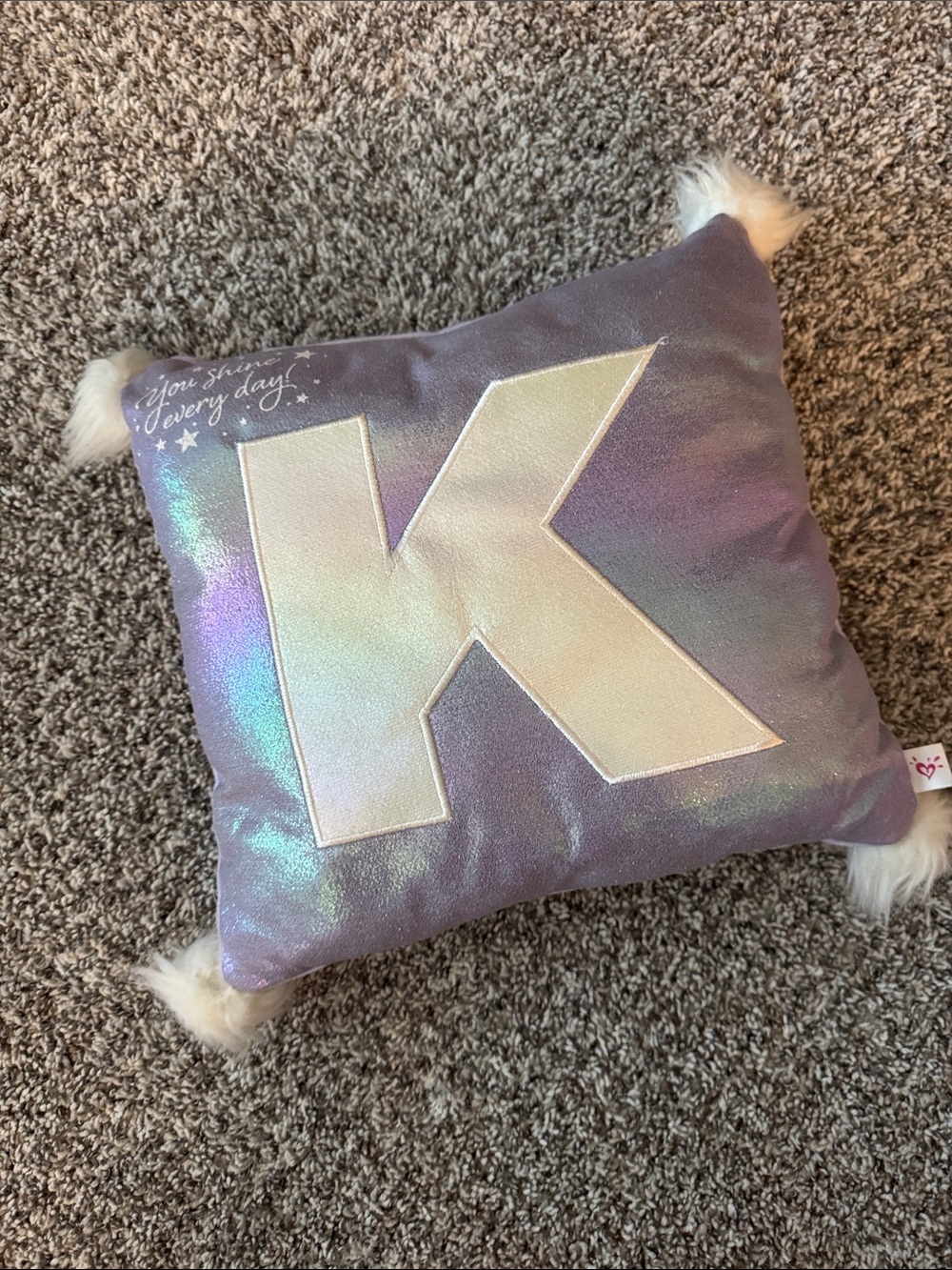 Justice Iridescent Purple Pillow with Cream 'K' Accent